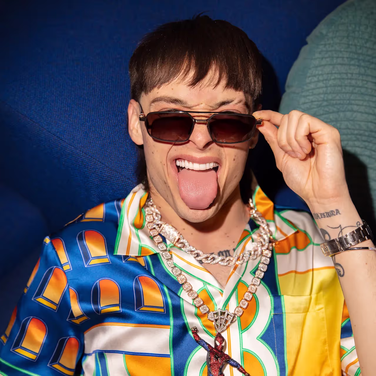 Peso Plumo wearing glasses