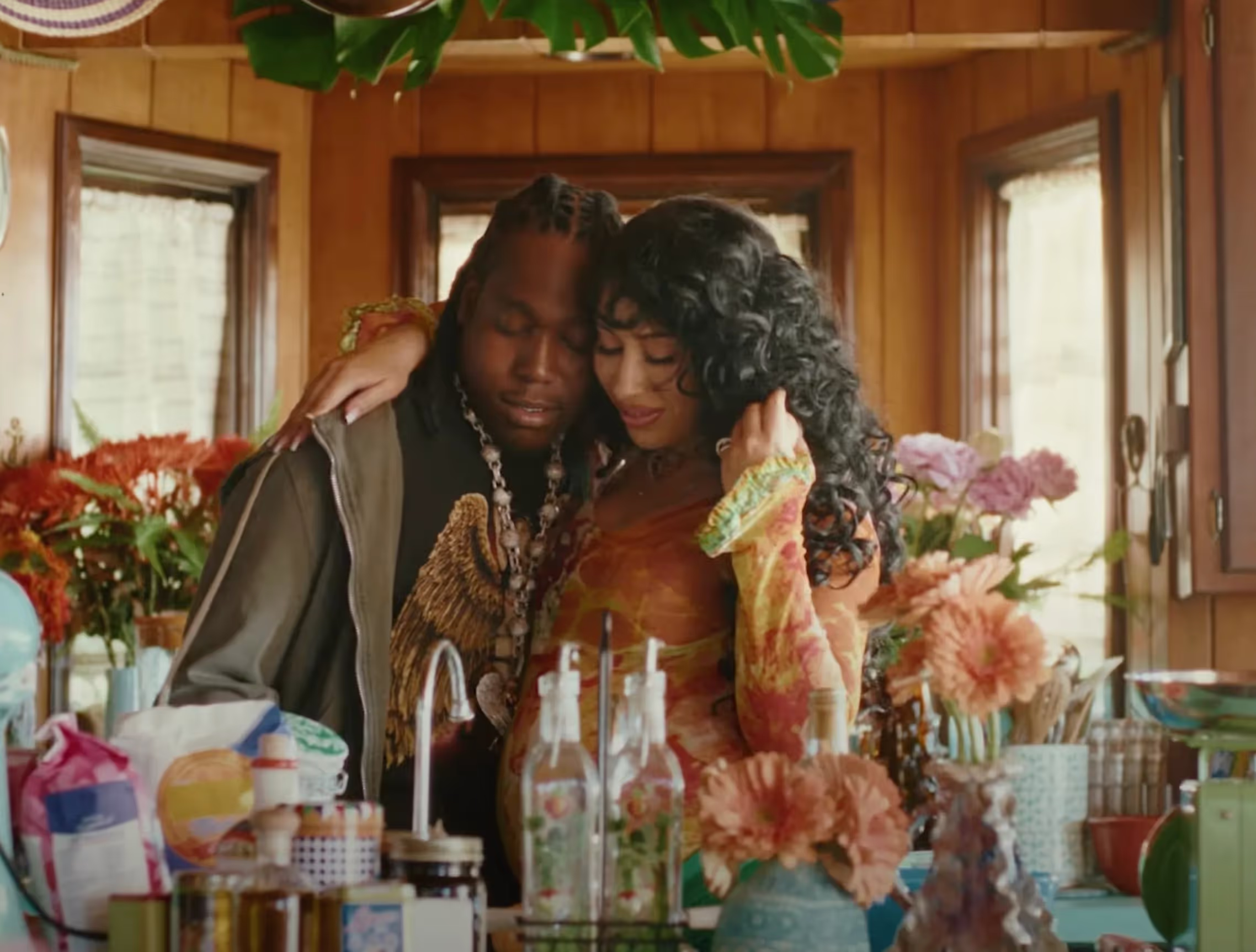 Don Toliver and Kali Uchis in a music video "Tu Corazón Es Mío"