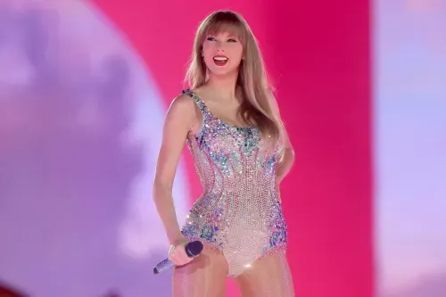 Taylor Swift performs during the Era Tour wearing dazzling outfit