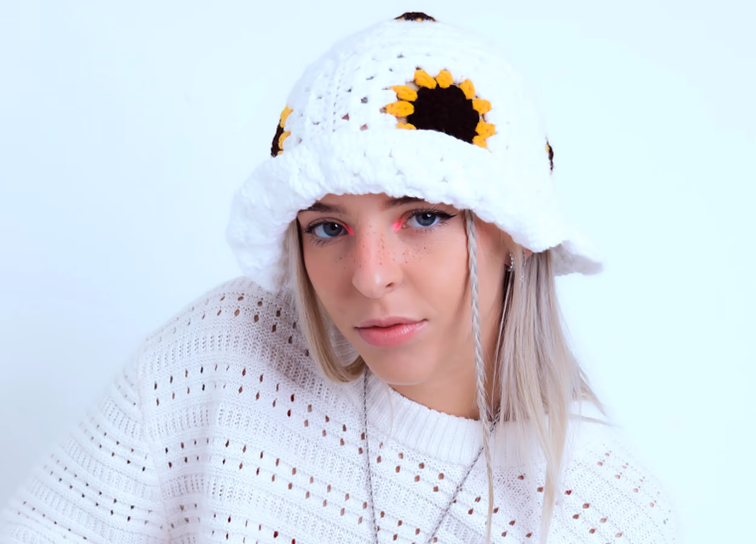 Young Mio wearing a white outfit