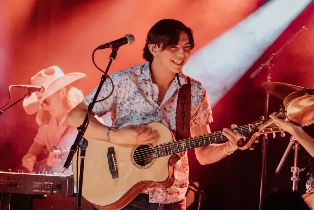 Wyatt Flores performes on the stage, amidst announcement of the 2024 "Life Lessons" tour