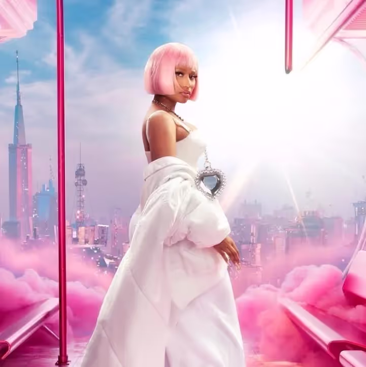 Nicki Minaj wearing short pink wig and white suit on a cover of 'Pink Friday 2' released December 8