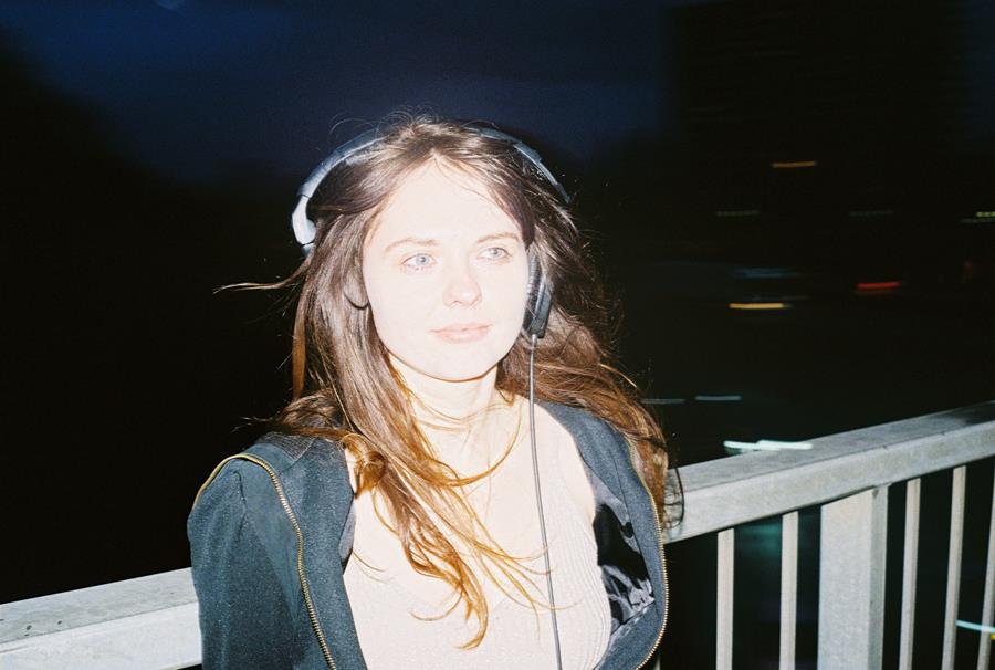 Bobbi Lu, portrait wearing headphone