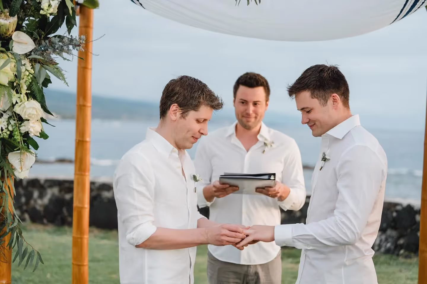 Open AI CEO Sam Altman and Oliver Muherin exchanging rings