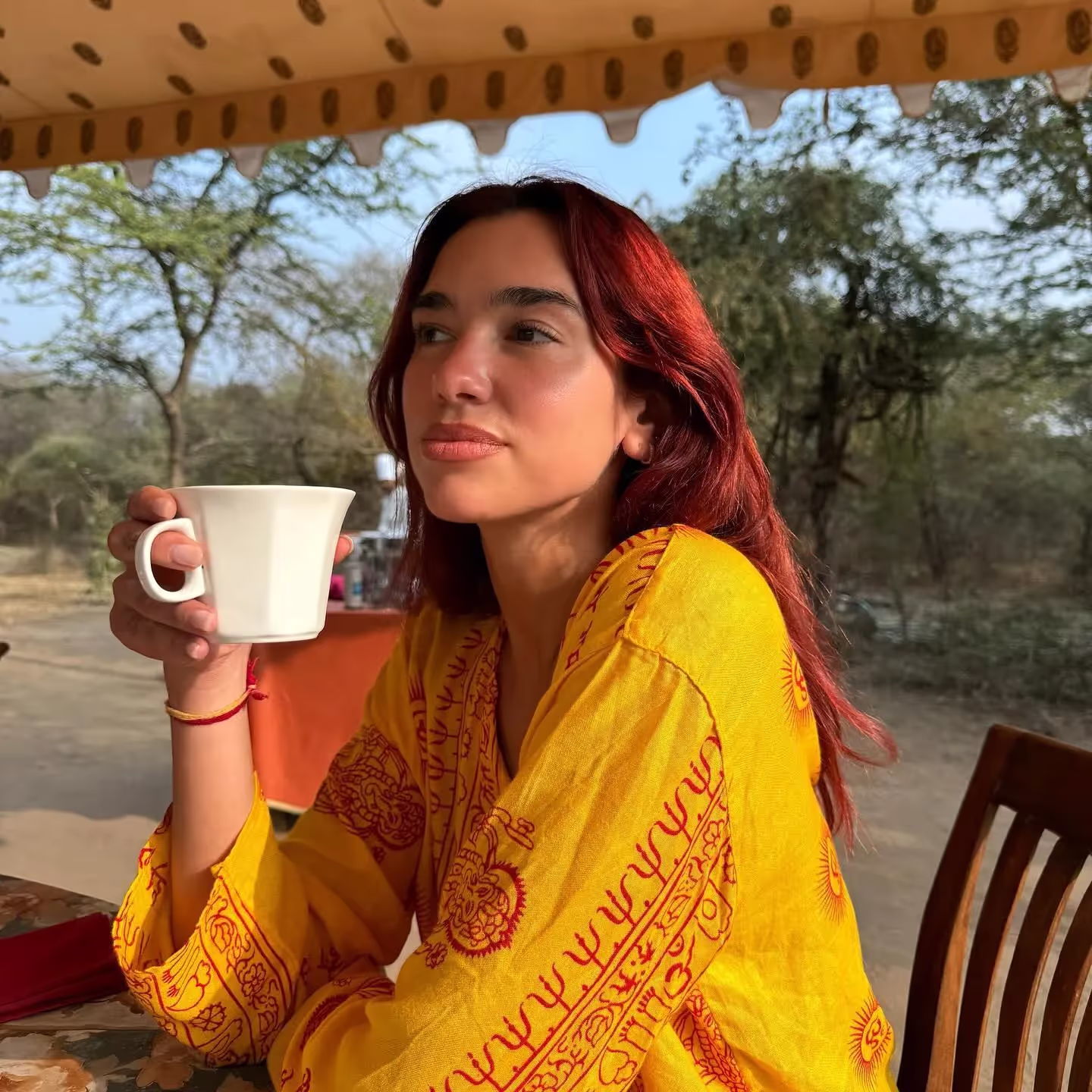 Dua Lipa wearing a traditional yellow Rajasthani Kurta during her trip in India
