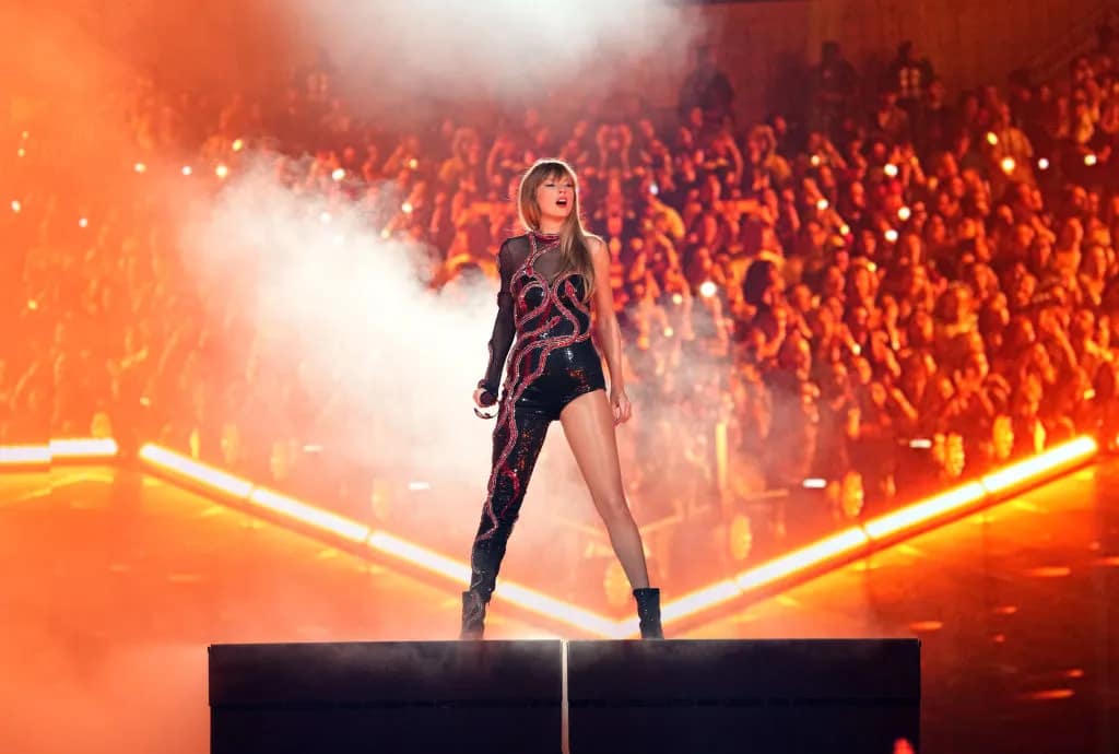 Taylor Swift performing on the stage during the Era Tour